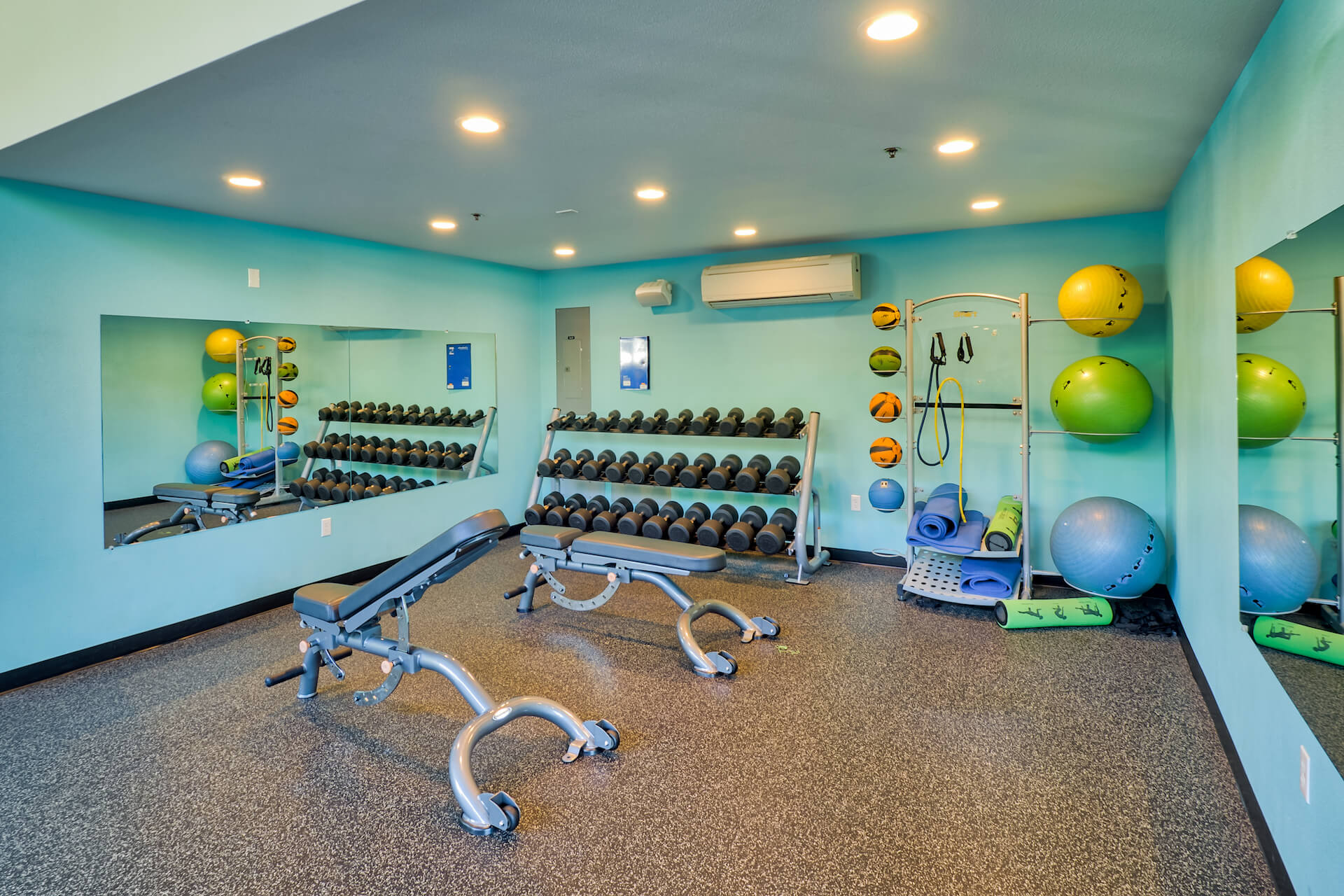 fitness center at the soto apartments
